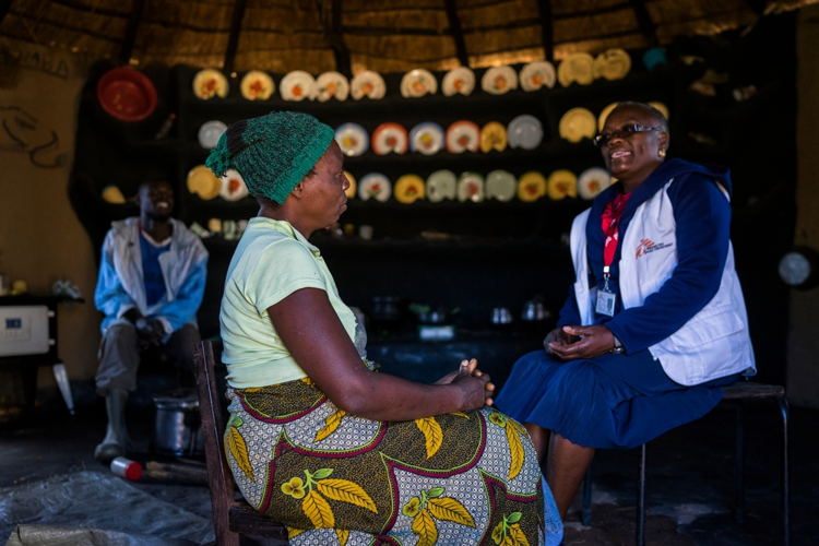 Beauty (36) and her husband Mr Chigouriemba (28) talk with MSF nurse mentor Sister Tendai about the possibility if having a child before having her uterus removed.

Testimony taken in March 2017

“When I met Charles six years ago, I told him I was living with HIV and had three children, but he still wanted to marry me. We desperately wanted to have a child together. 

Seven years ago, I lost my older sister to cervical cancer, and was worried it might happen to me as well. We only found out that she had cancer when it was too late and she had come home to die.

In September 2015, I had pain in my abdomen. I heard from a friend about the screening at Gutu rural hospital, so I went. 

The test results showed I had lesions that couldn’t be treated at the local clinic. MSF took me to Newlands clinic in Harare and paid for the procedure. The hospital told me it was serious and advised me to have my uterus removed, but, less than a month afterwards, I found out I was pregnant.

We both wanted it [a child], but my husband was torn because he didn’t want to lose me. 

Throughout my pregnancy I had regular check-ups, and the doctor booked me for an elective caesarean to prevent any risks.

Our baby is two weeks old now, and we are both so happy. I’ve been advised to have another test for cervical cancer six weeks after my delivery. Now that we have a child, I’m fine with any course of treatment, even a hysterectomy.

My strong message is that every woman should get screened, there’s no shame in it. I would have stayed in the dark if I hadn’t been screened.” Photographer: Melanie Wenger/COSMOS
