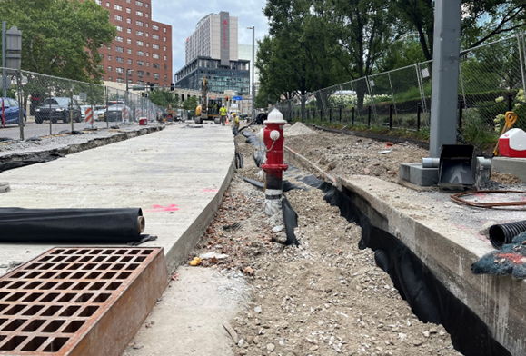 Inside the work zone at Sixth Avenue and Grant Street where contractors relocated a fire hydrant and catch basin to accommodate the expanded sidewalk Inside the work zone at Sixth Avenue and Grant Street where contractors relocated a fire hydrant and catch basin to accommodate the expanded sidewalk
