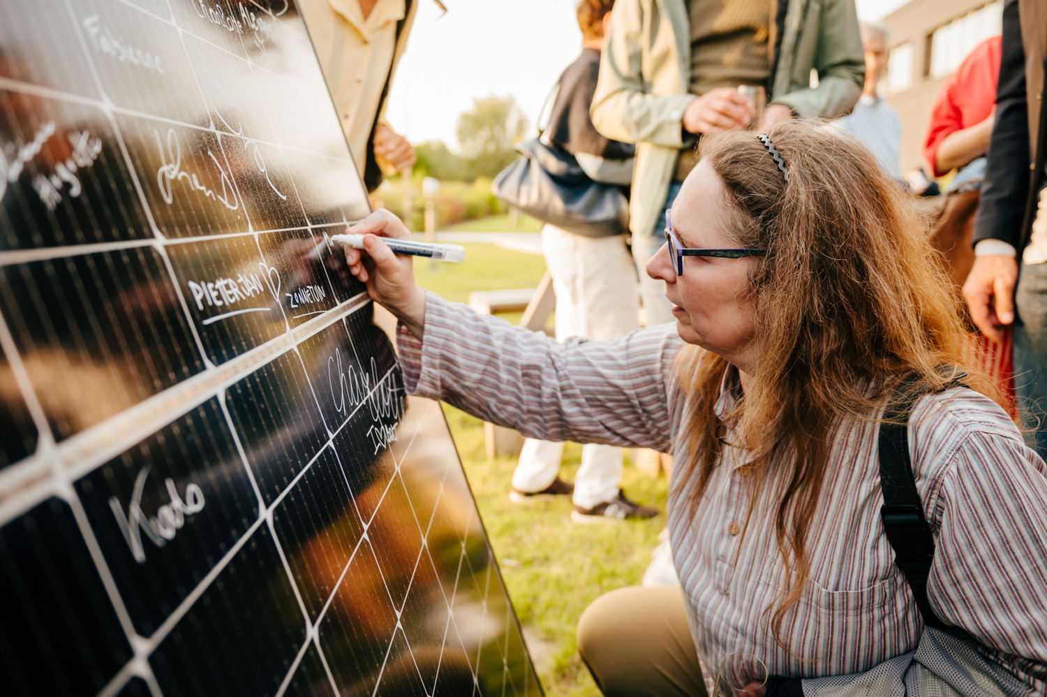 De investeerders van de eerste collectieve zonnetuin in Brugge ©Stein Van der Looij