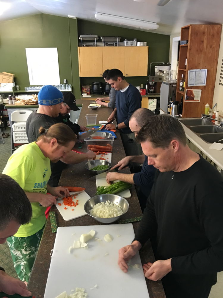 Wellmen participants during a cooking activity.