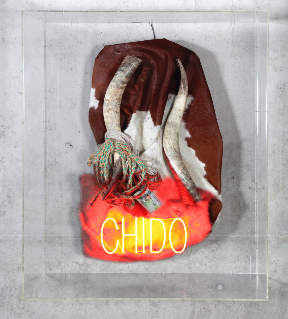 Koen Vanmechelen, Chido, Cowhide and horns, neon, rope and plexiglass nameplate, 146 h x 122 x 46 cm © Koen Vanmechelen, 2018, photo by Kris Vervaeke