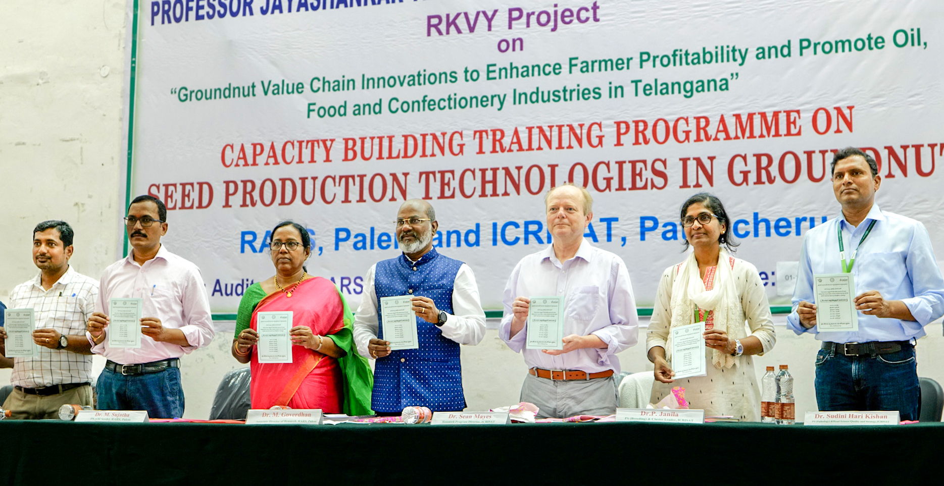 RARS-Palem, Krishi Vigyan Kendra and ICRISAT scientists release the promotional leaflet on good agricultural practices for groundnut cultivation.