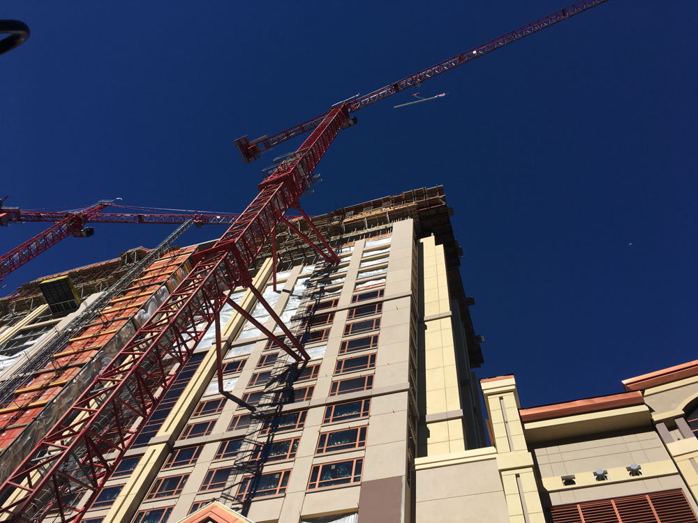 The signed beam with an American flag is hoisted to the top of the 23rd floor of the new Monarch Casino Resort Spa in Black Hawk.