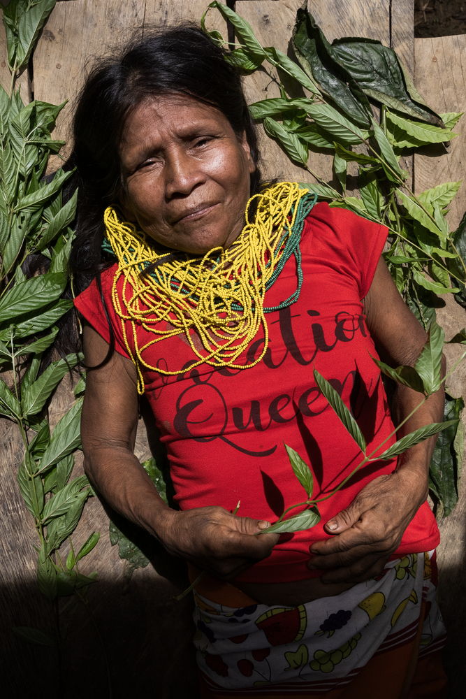 Jaibaná (healer of the spirit) Dilia, from the community of Puesto Indio, Alto Baudó, Chocó. In Riverographies of Baudó, seven healers and midwives symbolically healed the wounds of their territory. Each female healer tore an image of the place she wanted to heal and then, in the same way she has kept her community healthy, applied herbs and sutures to heal it.