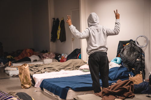 One of the big rooms where people sleep. This man told us: "Show the conditions in which we all live here. Peace and love ! " Copyright: MSF/Pierre Fromentin (MSF) One of the big rooms where people sleep. This man told us: "Show the conditions in which we all live here. Peace and love ! " Copyright: MSF/Pierre Fromentin (MSF)