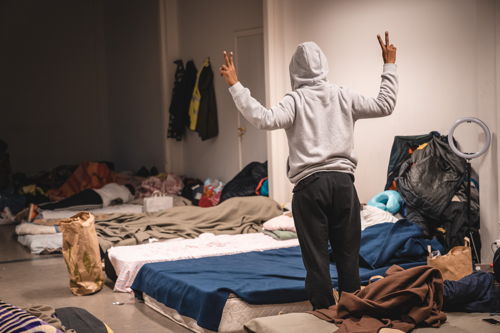 One of the big rooms where people sleep. This man told us: "Show the conditions in which we all live here. Peace and love ! " Copyright: MSF/Pierre Fromentin (MSF)