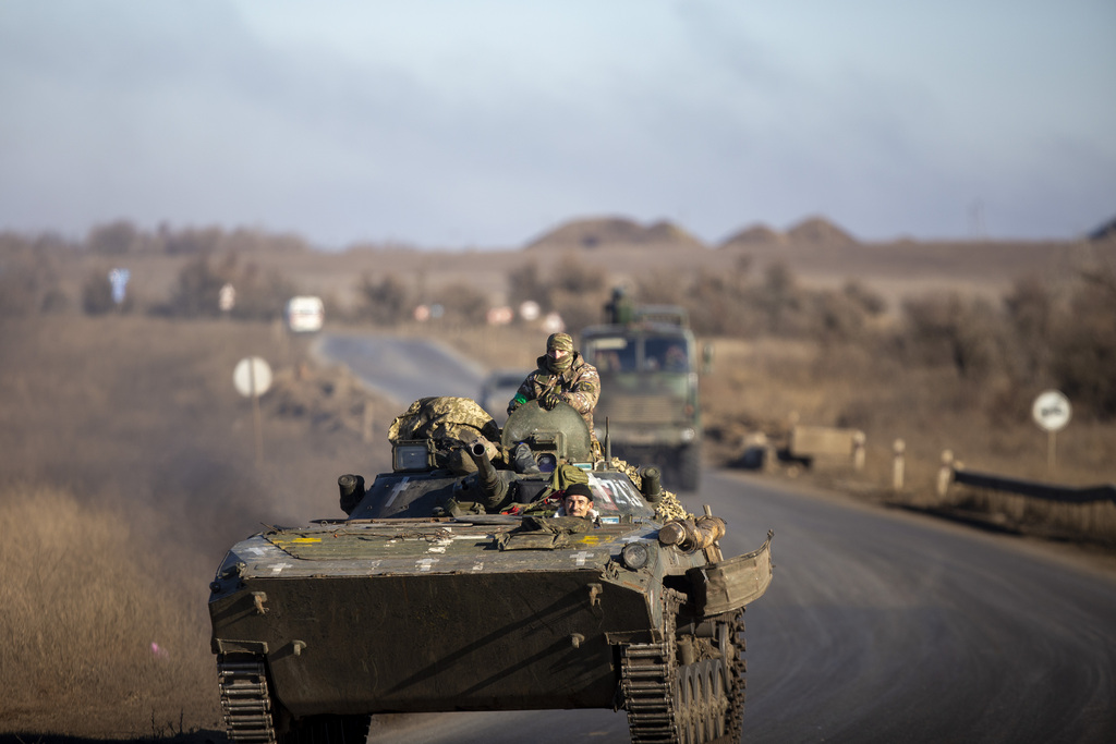 DONETSK OBLAST, UKRAINE - JANUARY 26: Ukrainian soldiers are seen on their ways to the frontlines with their armored military vehicles as the strikes continue on the Donbass frontline, during Russia and Ukraine war in Donetsk Oblast, Ukraine on January 26, 2023.