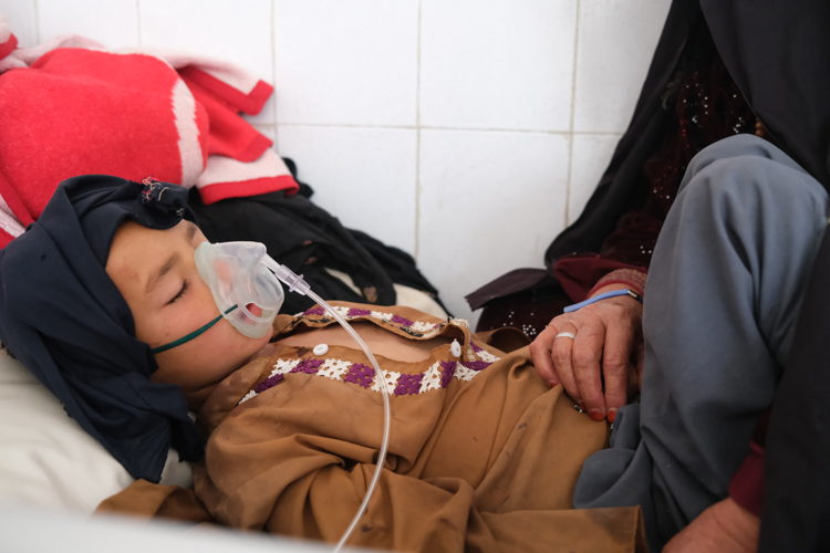 A patient in the measles isolation ward at Boost hospital. Over 440 measles patients were admitted to the ward in January and February 2022. 