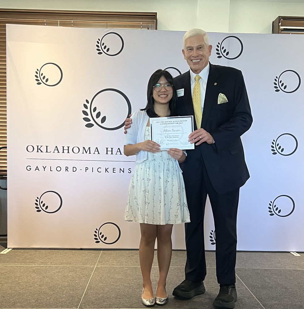 OHOF Board Member Wes Milbourn presenting scholarship to Allison Nguyen