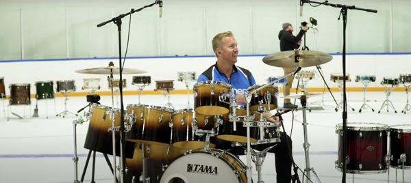 Drummer plays world’s longest drum fill with 125+ drums to support MusiCounts charity