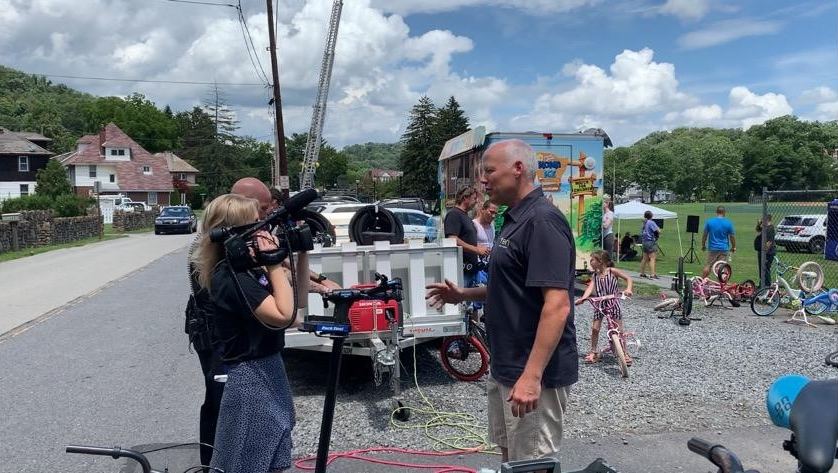 Rob Campbell, Chief Operating Officer of TEN, interview with local media at Johnstown's Roxbury Park.