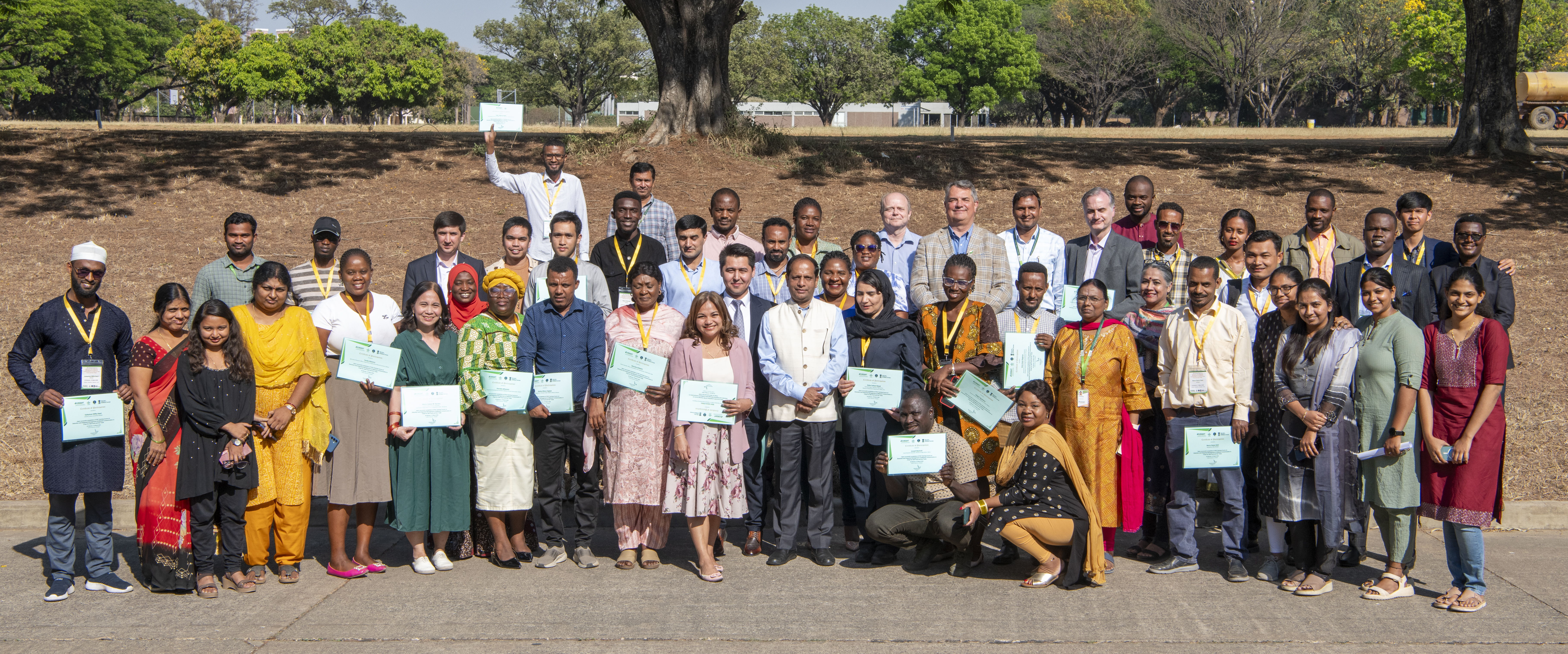 With certificates in hand, participants pose for a photo alongside Dr Himanshu Pathak.