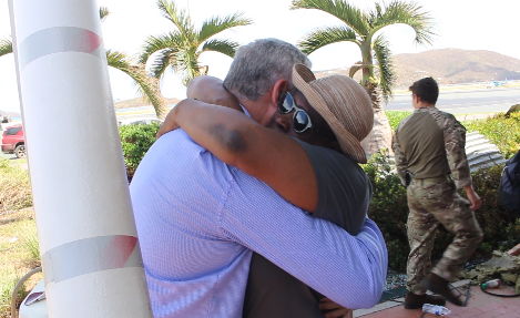 An emotional OECS national embraces Prime Minister Chastanet in the British Virgin Islands.
