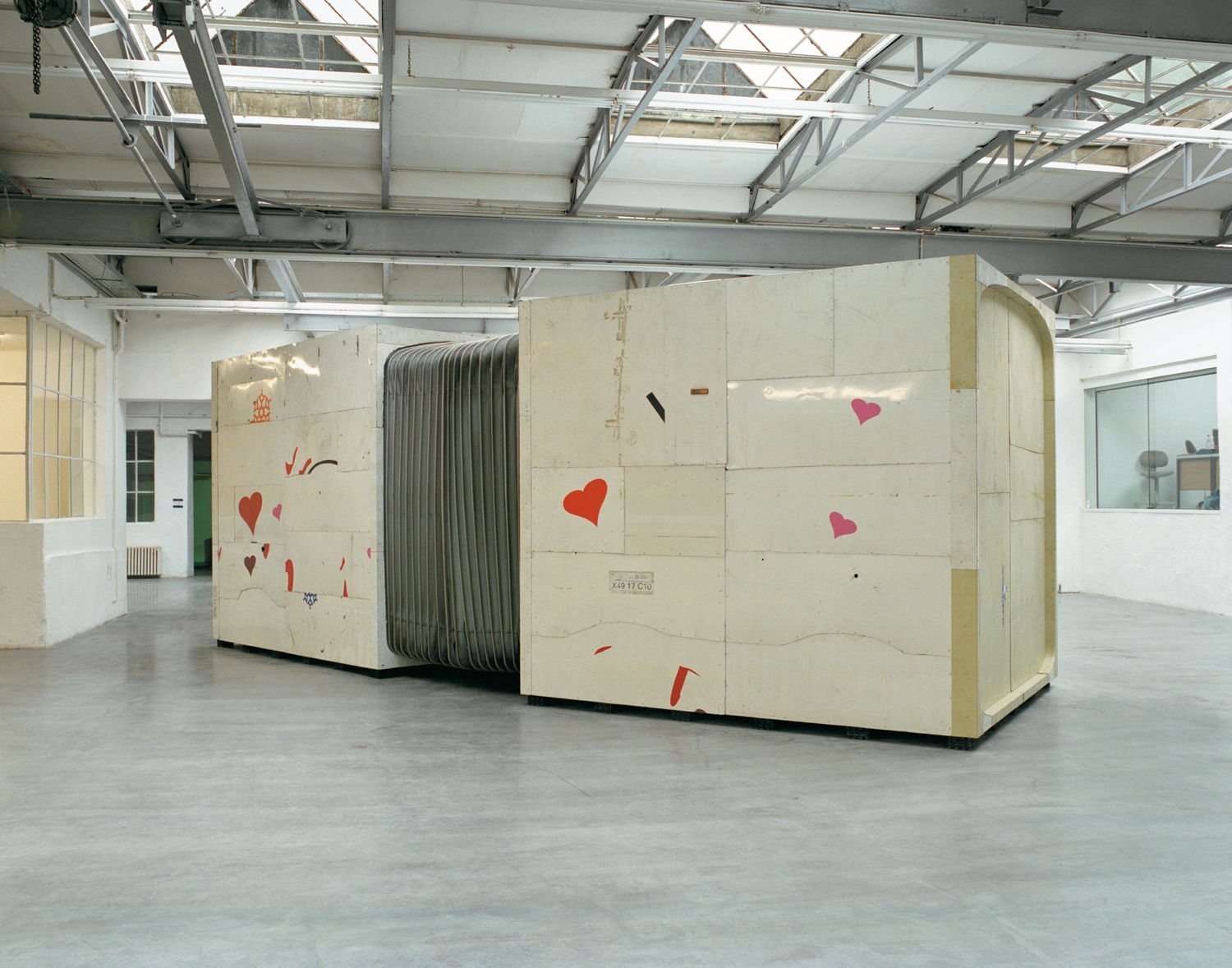 Michael Sailstorfer, Dean & Marylou, 2003. Sheetmetal (Omnibus), Wood, 280 × 260 × 800 cm