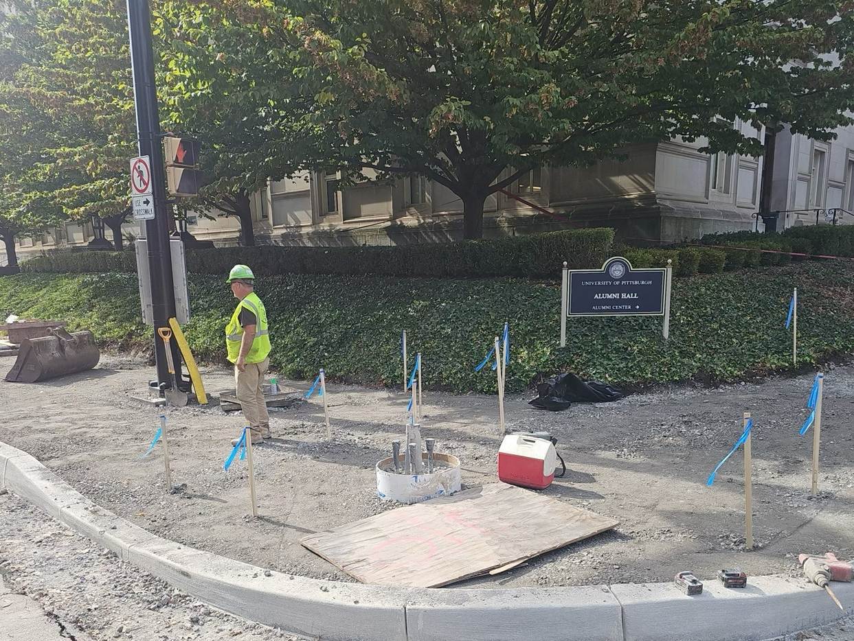 Crews recently placed new curb at Fifth Avenue and Tennyson Street