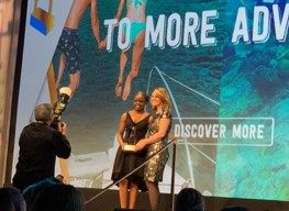 Junior Minister Accepting Adrian Award.
