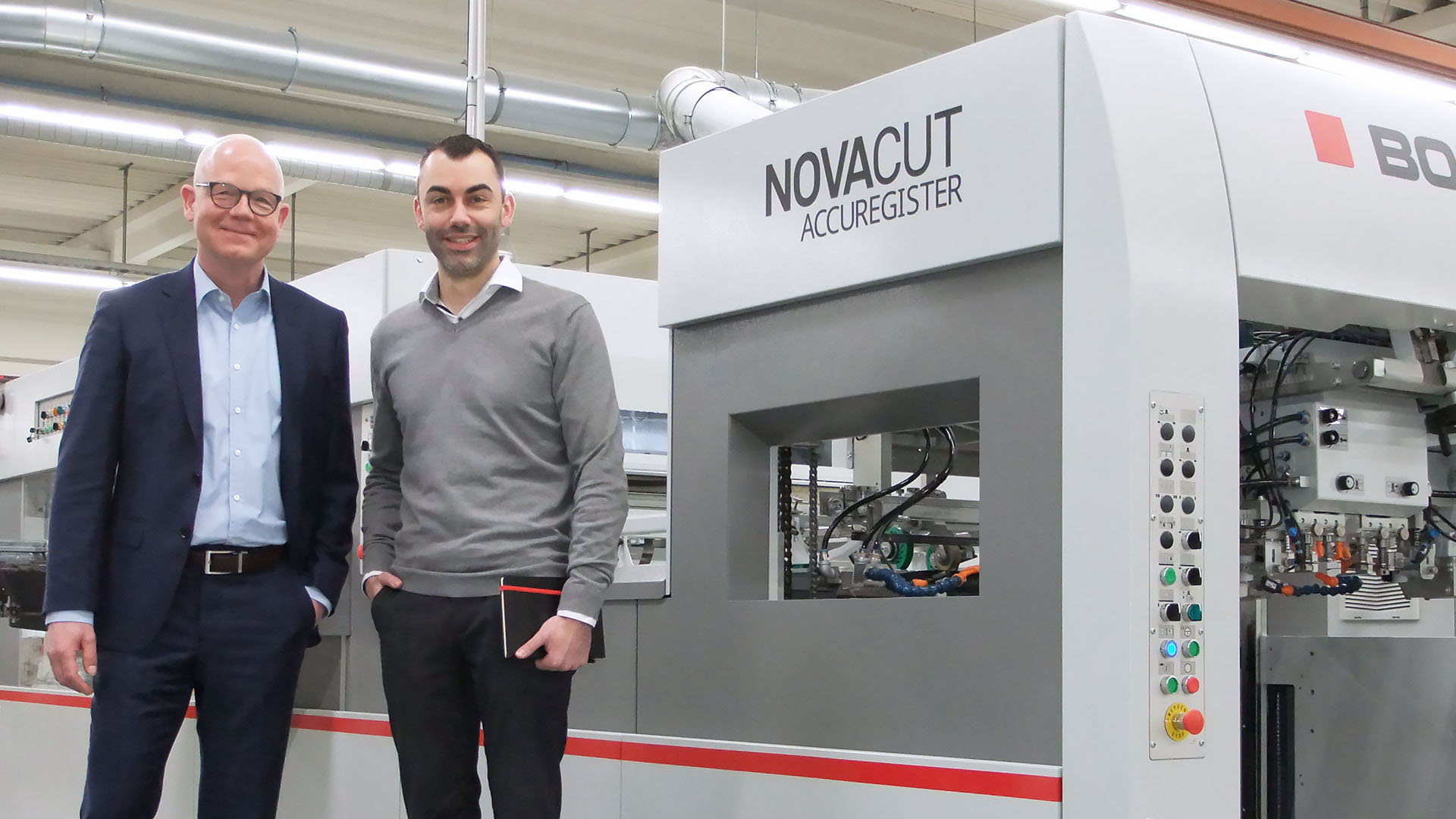 Within a few months, they have carried out successfully the beta testing of the BOBST NOVACUT 106 ER flat-bed die-cutter with the new ACCUREGISTER “contactless” sheet-feeding: ​ Höhn Display + Packaging Operations manager Markus Laepple (right) and Hans Dreistein (Bobst Meerbusch).