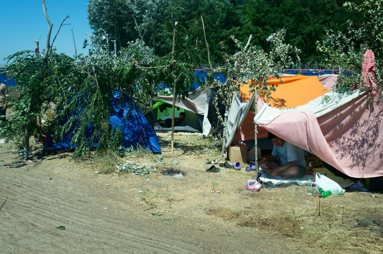 Christophe Hebting/MSF
Medecins Sans Frontieres (MSF) teams are working with refugees and migrants in the transit zones of Kelebjia and Horgos in Subotica, Serbia on the Hungarian border.

These transit camps have formed because Hungary remains the only legal entry to the EU but the daily quotas reduced to 8-15 people per day per transit zone. This creates back-log accentuated by violent push-backs.