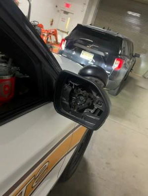 Driver's Side Damage of Troop 9 Squad Car