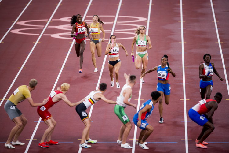 Belgian Jonathan Borlee and Belgian Camille Laus pictured in action during the heats of the 4x400m mixed relay race on the eighth day of the 'Tokyo 2020 Olympic Games' in Tokyo, Japan on Friday 30 July 2021 (© BelgaImage-Jasper Jacobs)