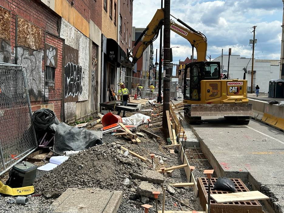 Sidewalk demolition and utility relocation on Fifth Avenue before Pride Street Sidewalk demolition and utility relocation on Fifth Avenue before Pride Street