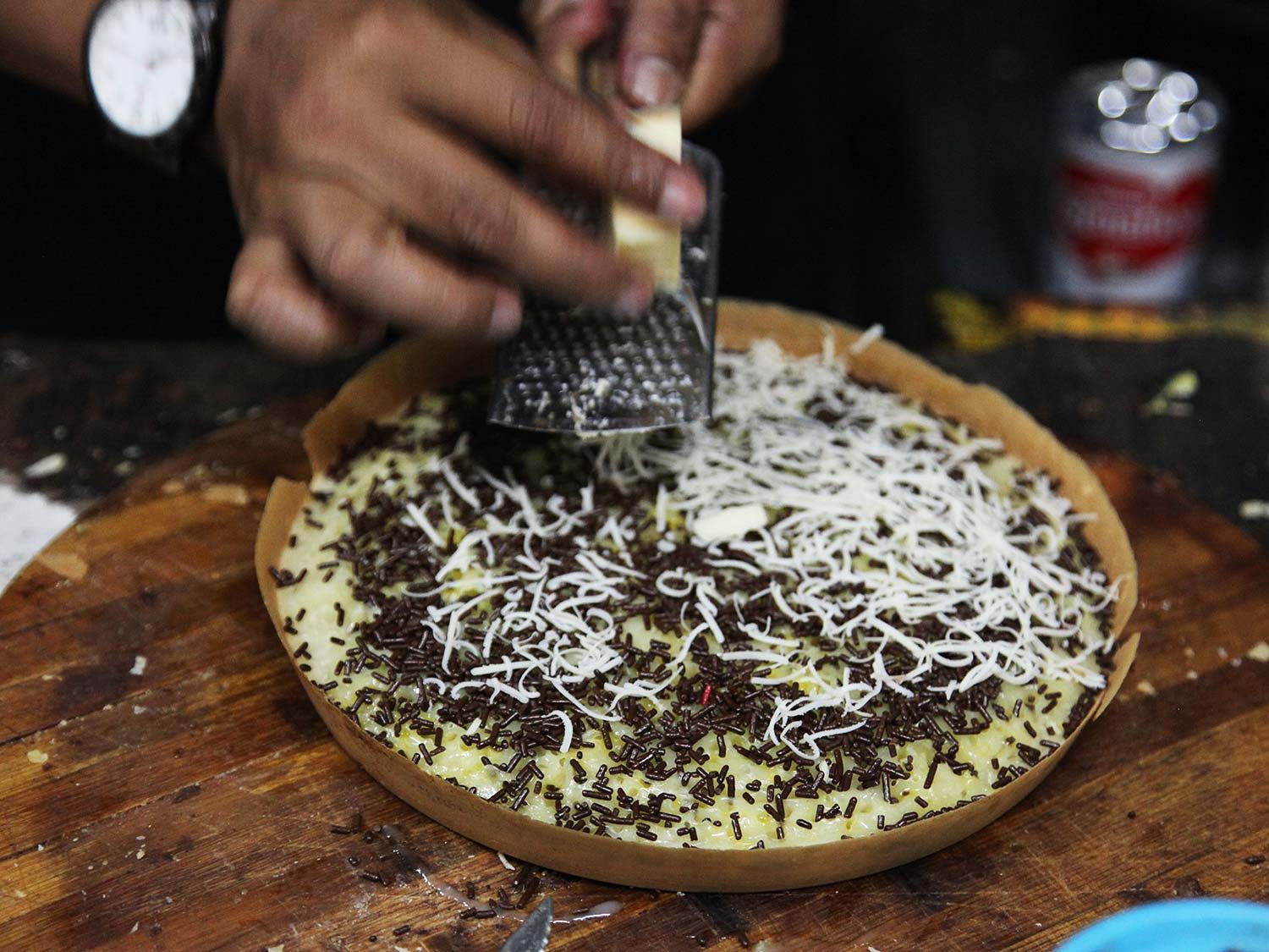 Grated fresh cheese slowly melting into the chocolate sprinkles is heaven.
