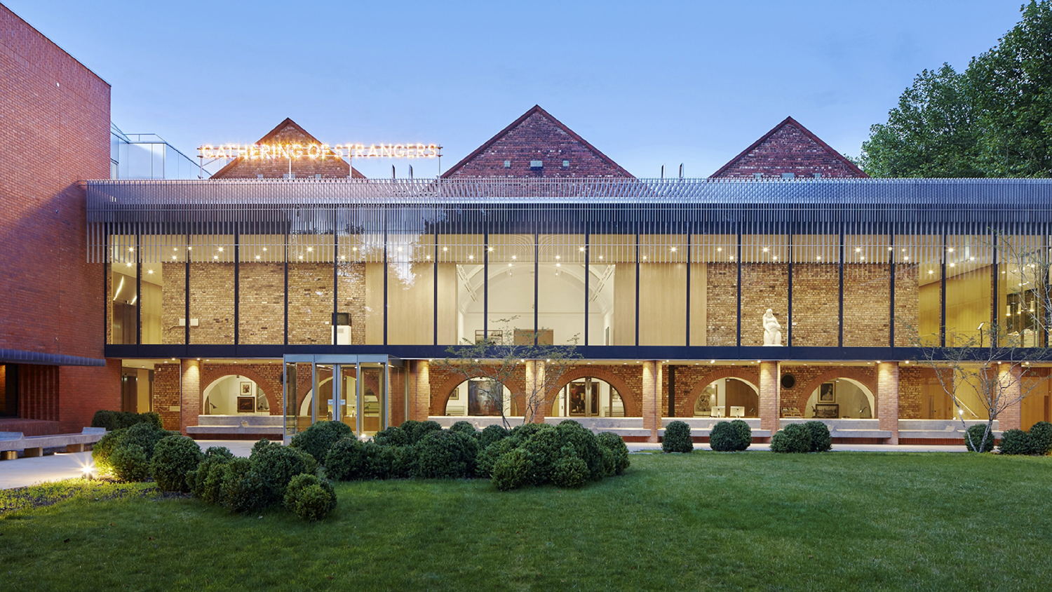 Exterior image of the Whitworth, 'Gathering of Strangers' artwork by Nathan Coley (2007). Photograph by Alan Williams ⓒ the Whitworth, The University of Manchester