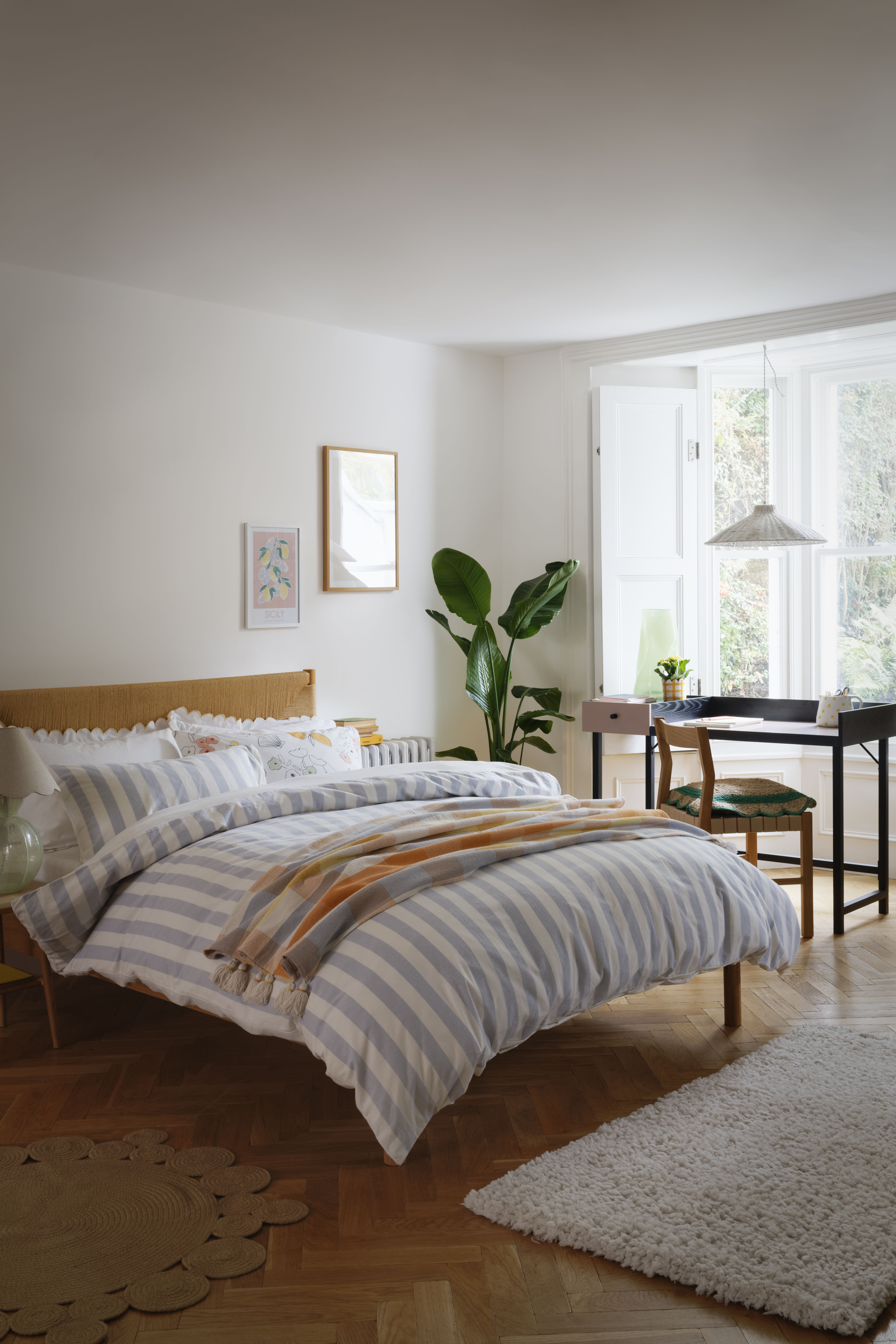 Framed Print Set, £130; Bed Frame, £360; Bedding Set, £40; Sicily Wall Art, £12; Check Throw, £26; Table Lamp, £65; Scallop Cushion, £16; Beverly Chair (pair), £180; Margot Desk, £150; Side Table, £105; Scallop Planter, £8; Jute Rug, £35; Pendant Light, £65 Framed Print Set, £130; Bed Frame, £360; Bedding Set, £40; Sicily Wall Art, £12; Check Throw, £26; Table Lamp, £65; Scallop Cushion, £16; Beverly Chair (pair), £180; Margot Desk, £150; Side Table, £105; Scallop Planter, £8; Jute Rug, £35; Pendant Light, £65