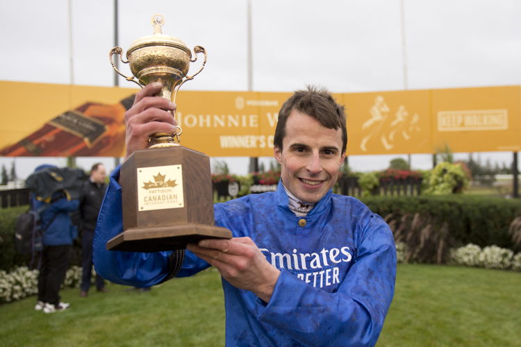 Nations Pride (IRE) and jockey William Buick winning the 2023 Canadian International at Woodbine (Michael Burns Photo)