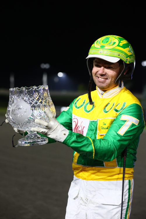 Tim Tetrick with the Metro Pace trophy (New Image Media)