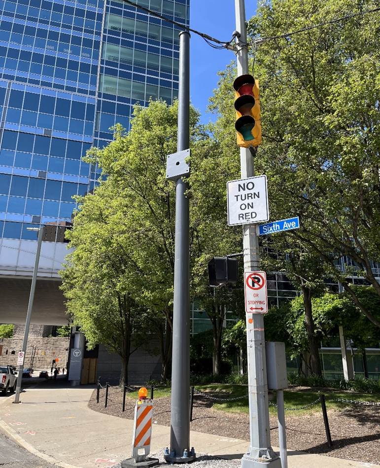 New traffic signal pole installed at Sixth and Centre Avenues