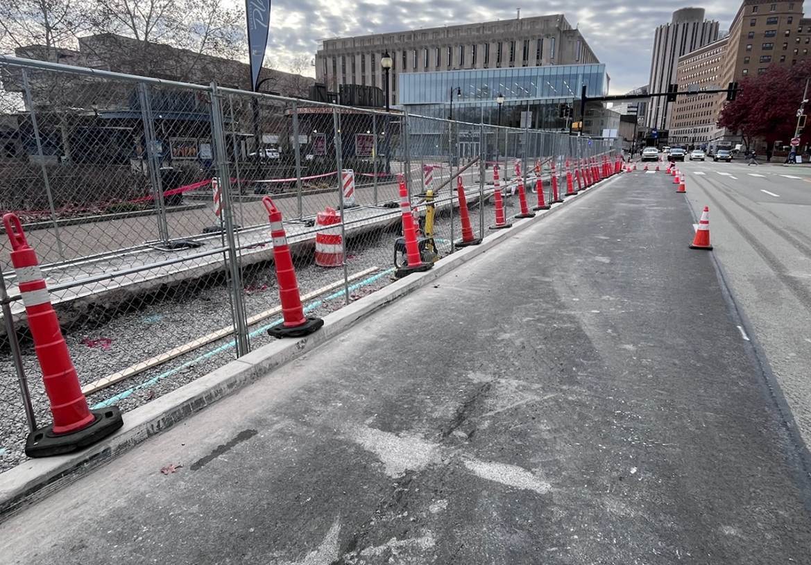 Construction fencing on Forbes Avenue between Schenley Drive and Schenley Drive Extension