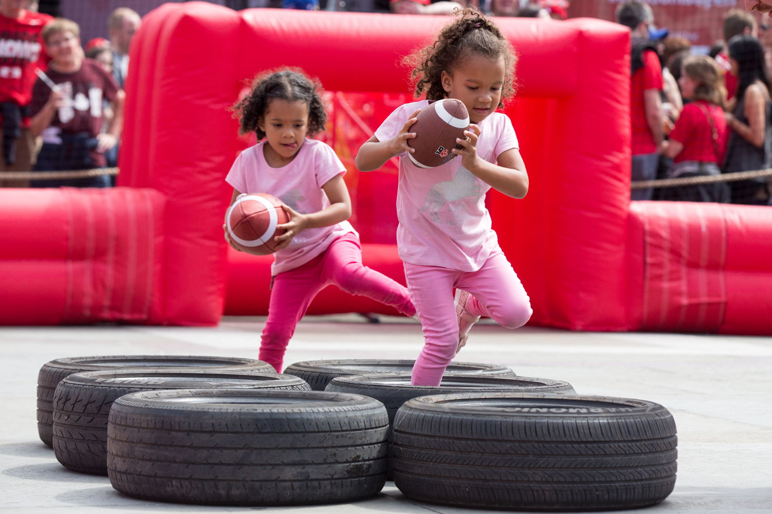 Youngsters going through the tire portion of the obstacle course. Photo Credit: Jim Ross/CFL