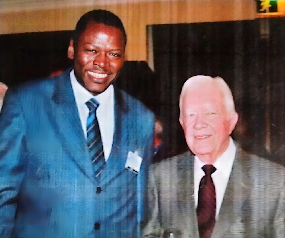 Dr Ramadjita Tabo with former U.S. President Jimmy Carter at the Borlaug Symposium. Addis Ababa, Ethiopia, 2010.