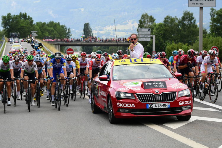 The ŠKODA SUPERB on the track as command vehicle ('Red Car') for the director of the Tour de France, Christian Prudhomme, at the previous run of the cycling classic.