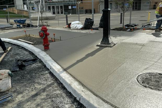 New sidewalk and curb recently installed at Fifth Avenue and Washington Place