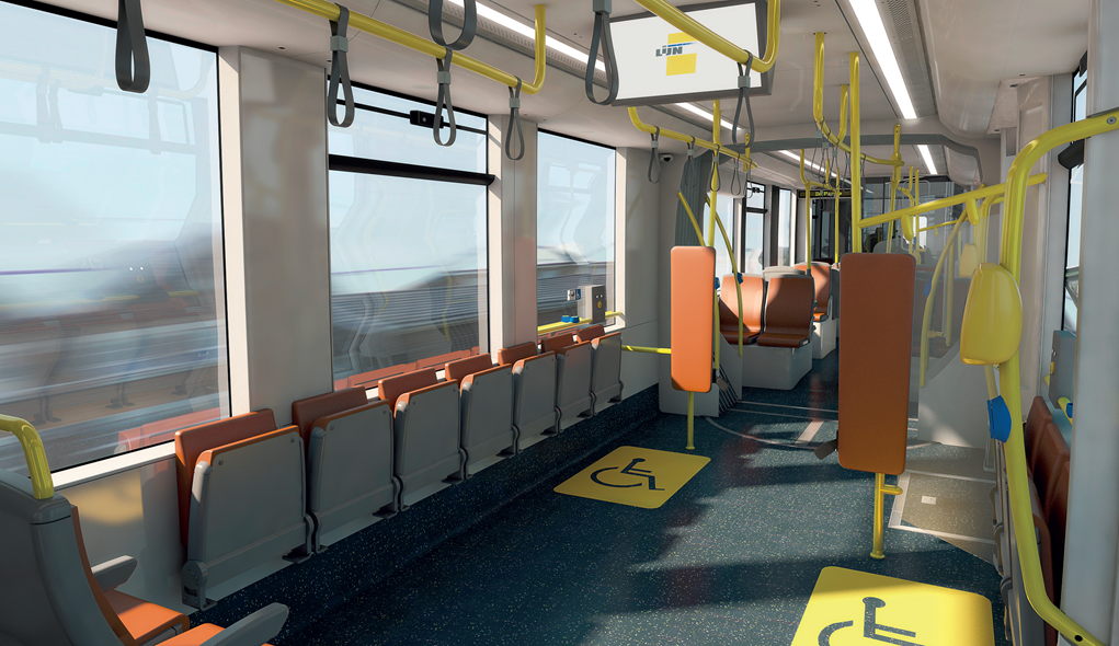 Interieur CAF-tram met klapstoelen en 2 rolstoelplaatsen.