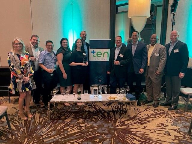 Leaders from The Efficiency Network (TEN) and Duquesne Light Co. gather after TEN was awarded 7th place as one of Pittsburgh Business Times&#x27; 2021 &quot;Fast 50&quot; companies. 