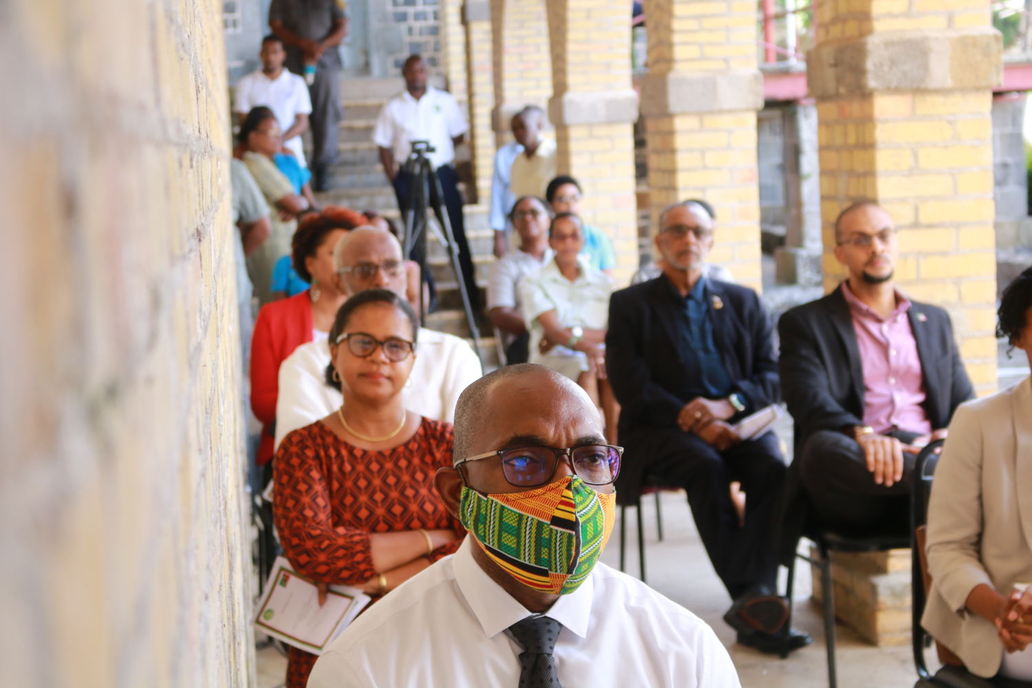 Staff of the OECS Commission and nationals of the Federation of St. Kitts and Nevis resident in Saint Lucia gather for a flag raising ceremony held in honour of the 37th Anniversary of Independence of St. Kitts and Nevis.