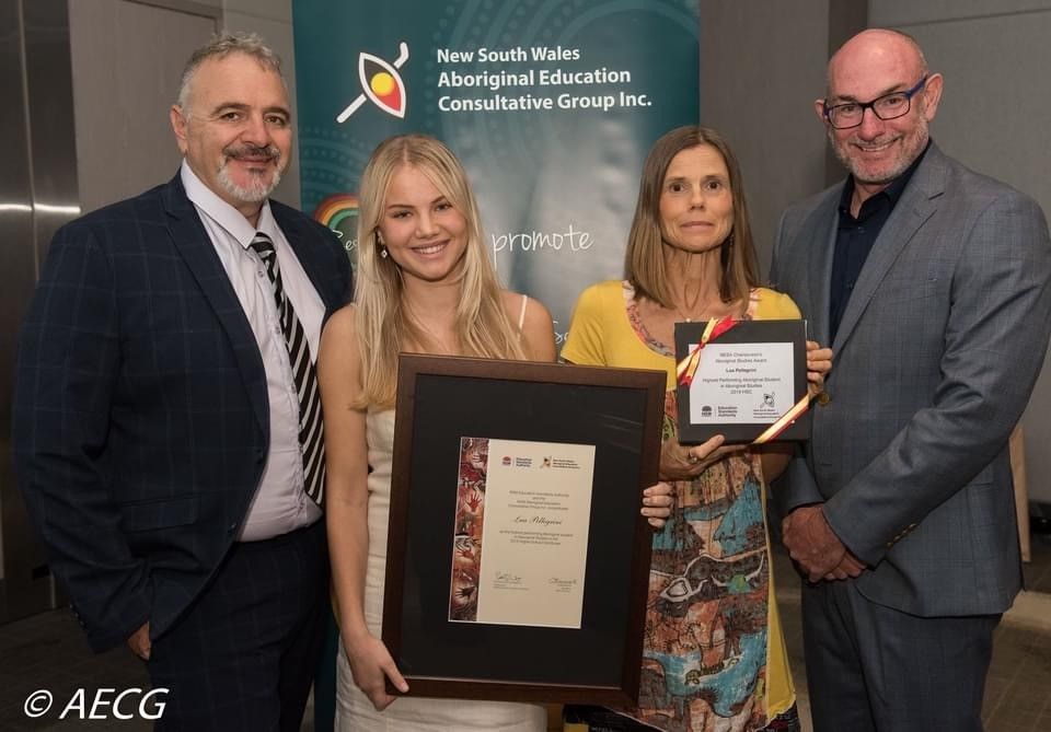 Lua Pellegrini receiving her NESA Award as the highest-achieving Aboriginal student in Aboriginal Studies in 2019. Image: AECG