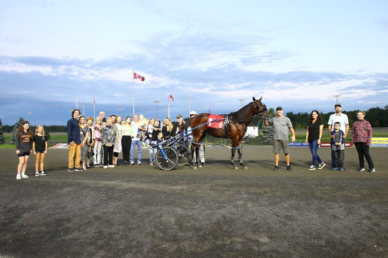 Legendary Hanover in the winner's circle for the first division of the Nassagaweya on August 26, 2023 at Woodbine Mohawk Park (New Image Media)