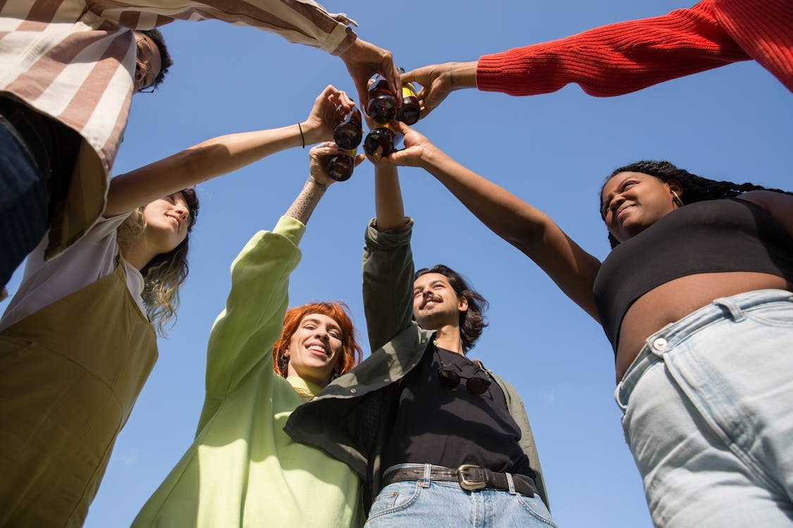 Free Friends Toasting with Their Beer Stock Photo