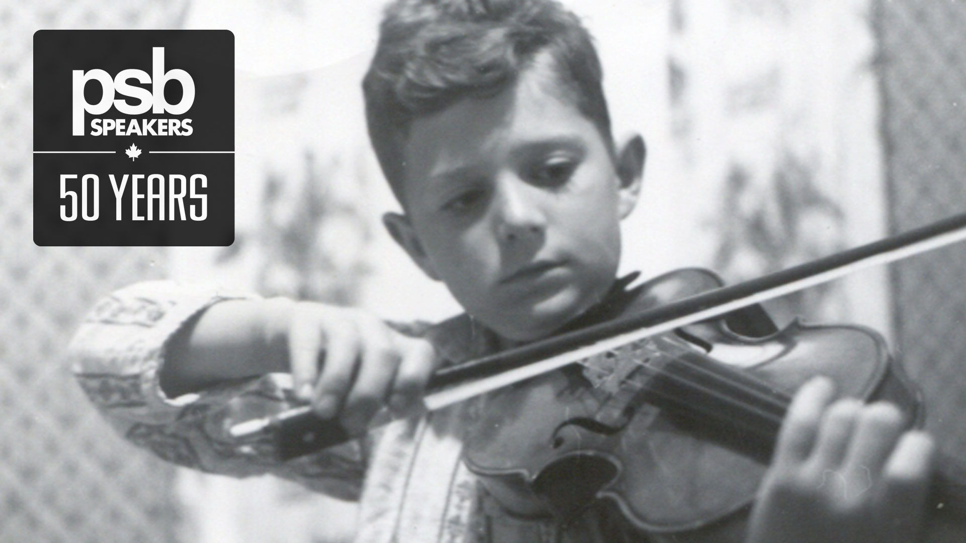 Paul Barton as a child playing the violin