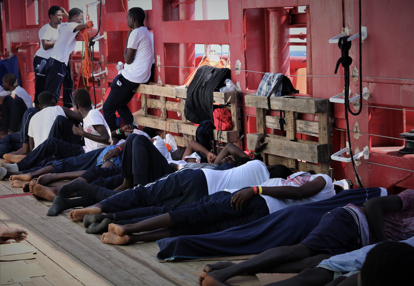 Rescued people sleeping on the deck onboard Ocean Viking. 
Copyright: Hannah Wallace Bowman/MSF