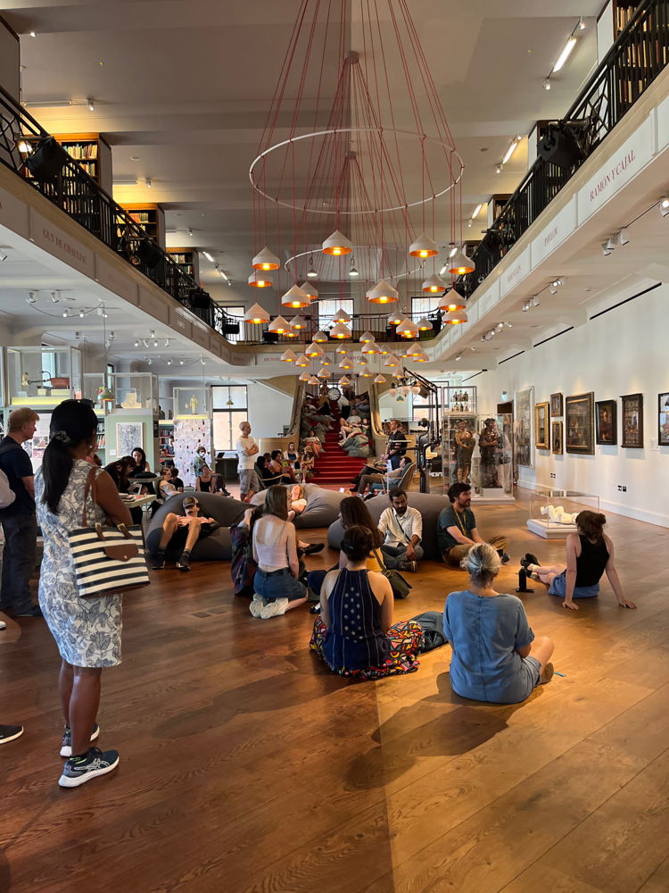 Audiences attend the Boalno installation at Land Body Ecologies Festival in Wellcome Collection. © Image courtesy of Invisible Flock.