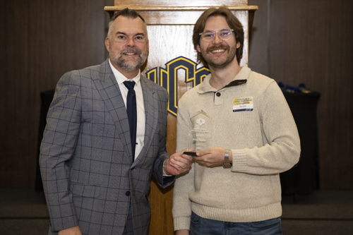 Riley Turner and Bryan Duke, Ph.D., dean of the UCO College of Education and Professional Studies