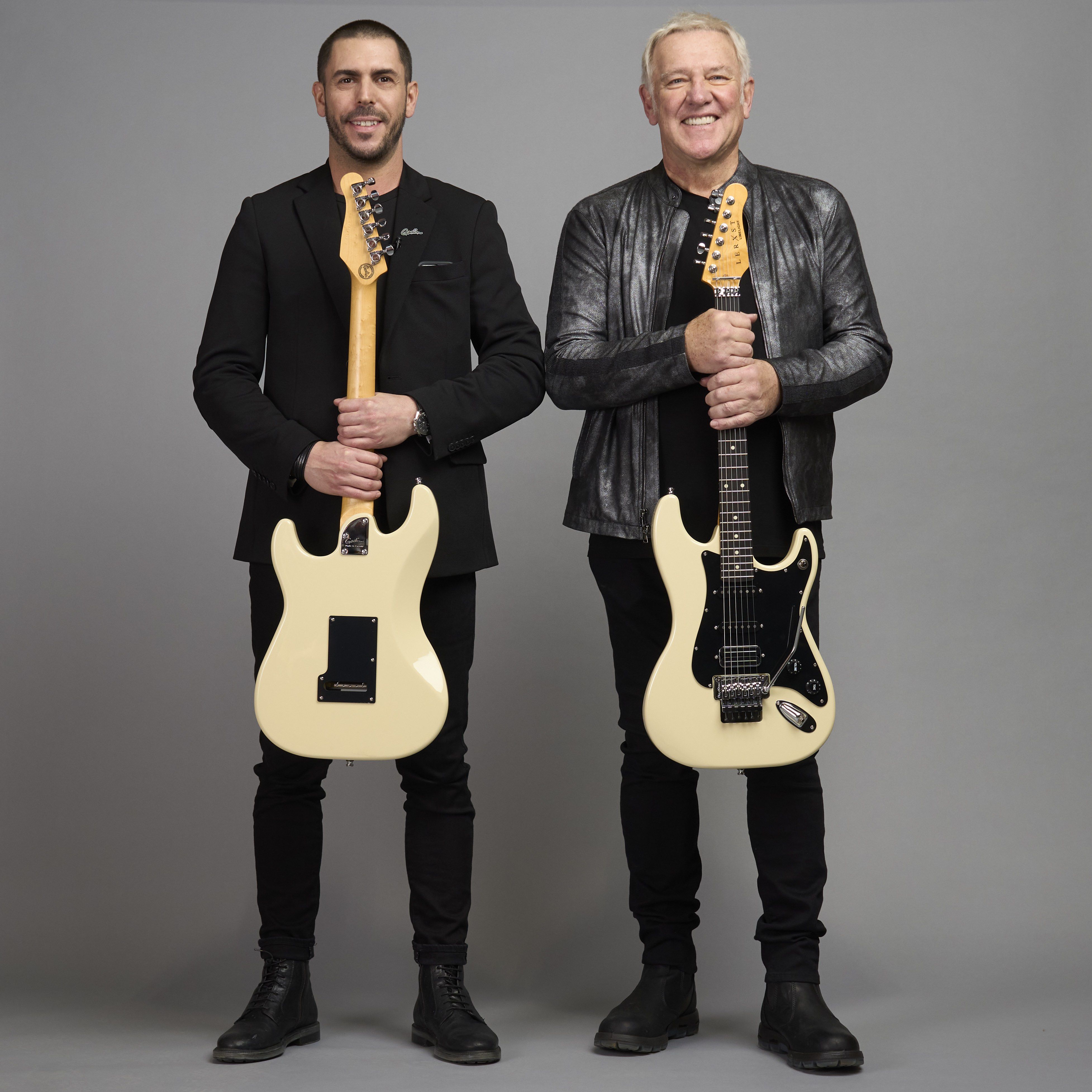 (L - R) Godin Guitars President and CEO Simon Godin, Alex Lifeson