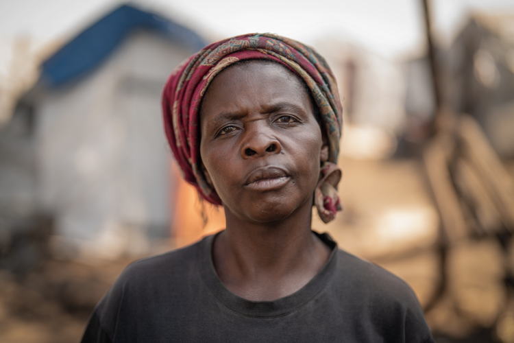 Portrait of Esther. She is one of the many people who have found refuge in Elohim camp near Goma. Copyright: Moses Sawasawa