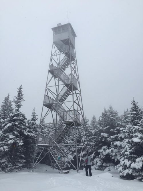 Balsam Lake Fire Tower in winter. On the National Register of Historic Places. Image by Upstate Adventure Guides.