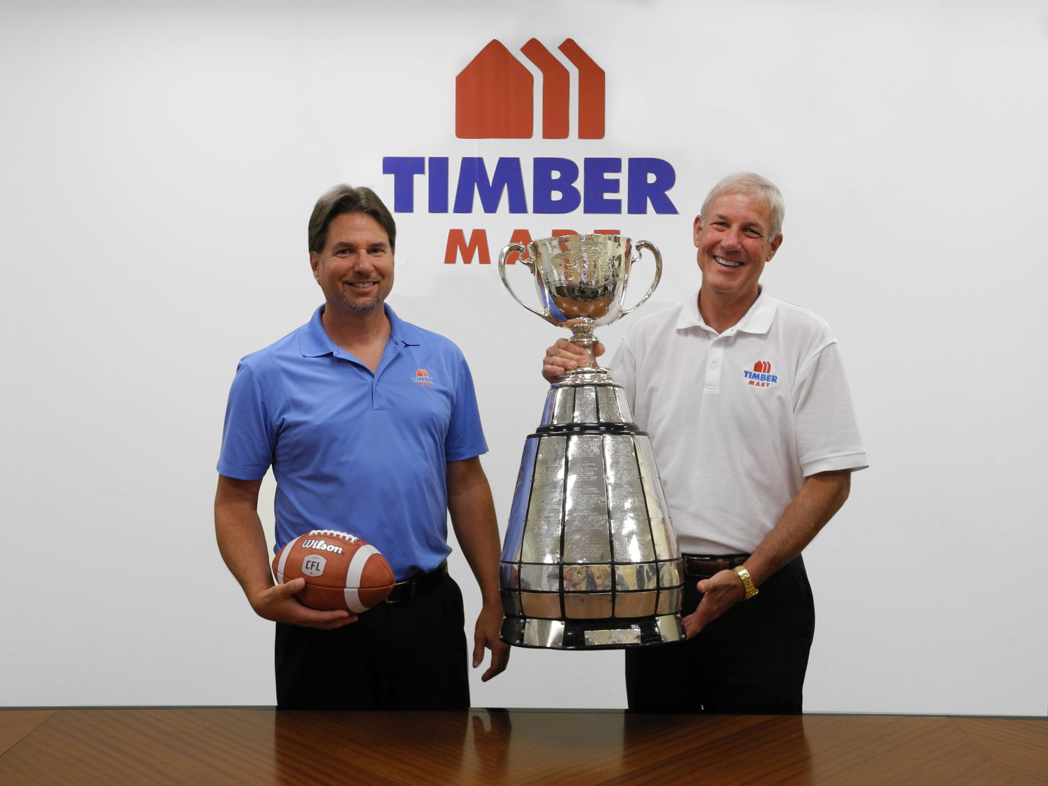 Jon Irwin (Vice President, Member Services) and Bernie Owens, TIMBER MART President.